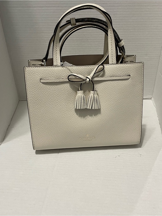 kate spade Handbags - kate spade Cream Pebbled Leather Satchel with Tassel